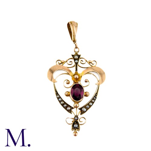 287 - An Antique Garnet and Pearl Pendant in 9k yellow gold, set with a principal oval cut garnet accented... 