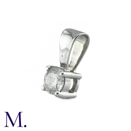 16 - A Diamond Solitaire Pendant, in 9k white gold, Set with a round brilliant cut diamond of 0.33cts. St... 