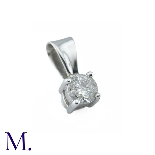 16 - A Diamond Solitaire Pendant, in 9k white gold, Set with a round brilliant cut diamond of 0.33cts. St... 