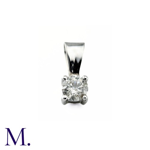 16 - A Diamond Solitaire Pendant, in 9k white gold, Set with a round brilliant cut diamond of 0.33cts. St... 