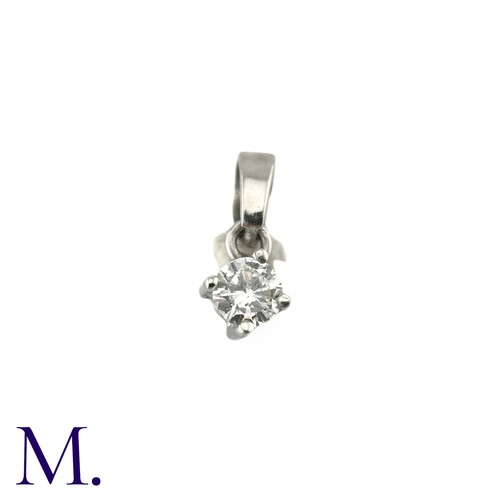 45 - A Diamond Solitaire Pendant, in 18k white gold, Set with a round brilliant cut diamond of approximat... 