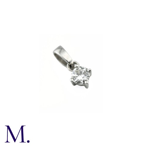 45 - A Diamond Solitaire Pendant, in 18k white gold, Set with a round brilliant cut diamond of approximat... 