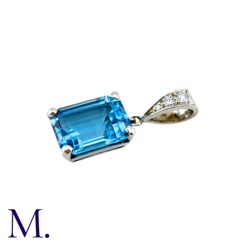 77 - A Blue Topaz And Diamond Pendant in 18k white gold the principal blue topaz of approximately 8.50cts... 