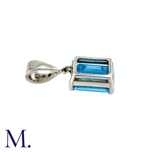 77 - A Blue Topaz And Diamond Pendant in 18k white gold the principal blue topaz of approximately 8.50cts... 