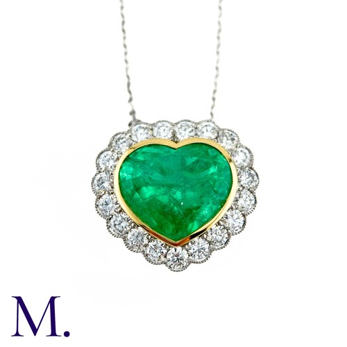 76 - An Emerald And Diamond Heart Shaped Cluster Pendant in 18k yellow gold and platinum, the principal h... 