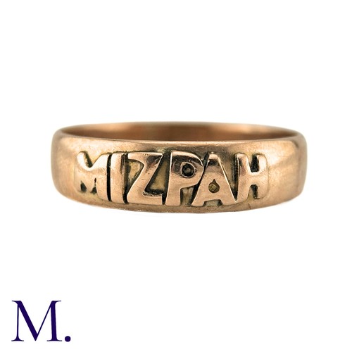 53 - An Antique Mizpah Ring in 9k rose gold, the band ring is embossed to the front with the word 'mizpah... 