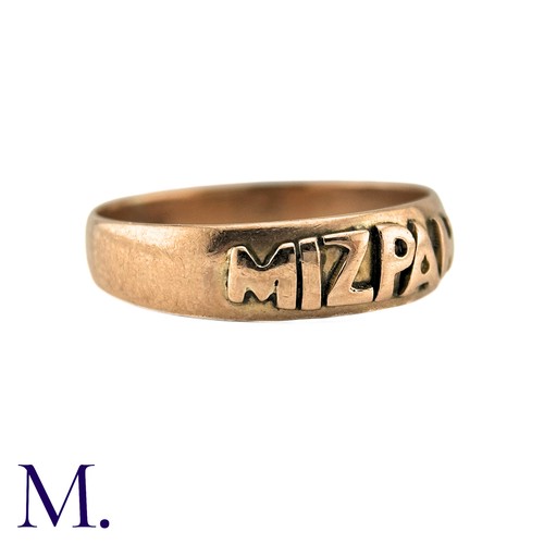 53 - An Antique Mizpah Ring in 9k rose gold, the band ring is embossed to the front with the word 'mizpah... 