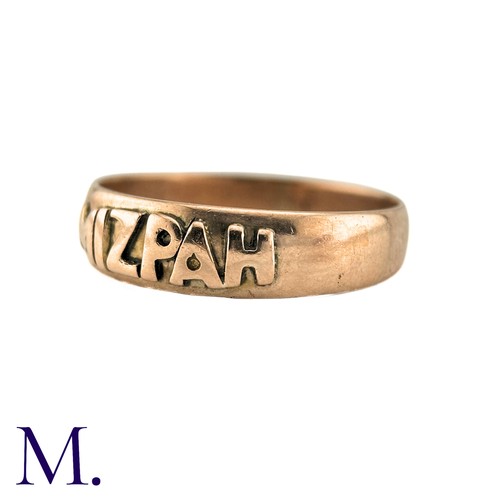 53 - An Antique Mizpah Ring in 9k rose gold, the band ring is embossed to the front with the word 'mizpah... 