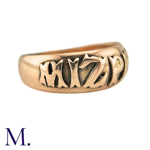 48 - A Mizpah Ring in 9k yellow gold, the band ring is embossed to the front with the word 'mizpah'. Hall... 