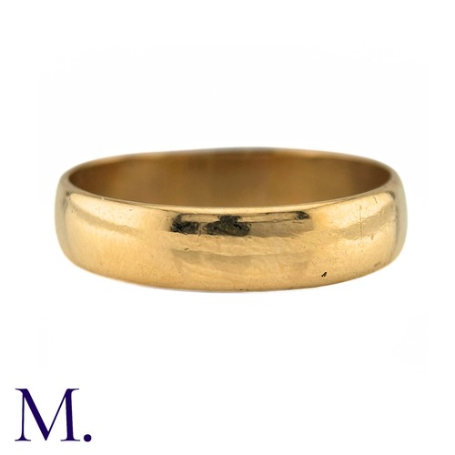 3 - A 22ct Gold Band. The polished band with full British hallmarks for 22ct. 

Size: Q
Weight: 3.7g