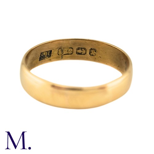 3 - A 22ct Gold Band. The polished band with full British hallmarks for 22ct. 

Size: Q
Weight: 3.7g