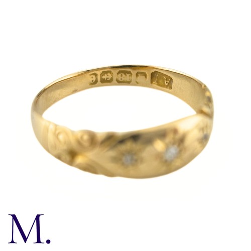 64 - A Diamond Three Stone Gypsy Ring in 18k yellow gold, set with three old cut diamonds. Partially Hall... 