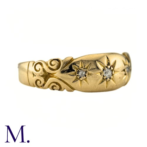 64 - A Diamond Three Stone Gypsy Ring in 18k yellow gold, set with three old cut diamonds. Partially Hall... 