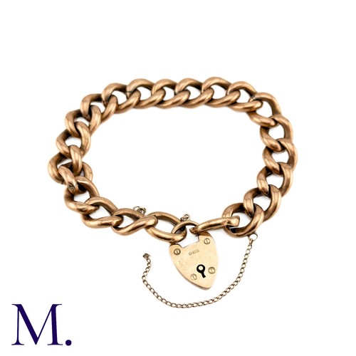 1 - An Antique Curb Bracelet in 9k rose gold, comprising a series of polished curb links, suspending a h... 