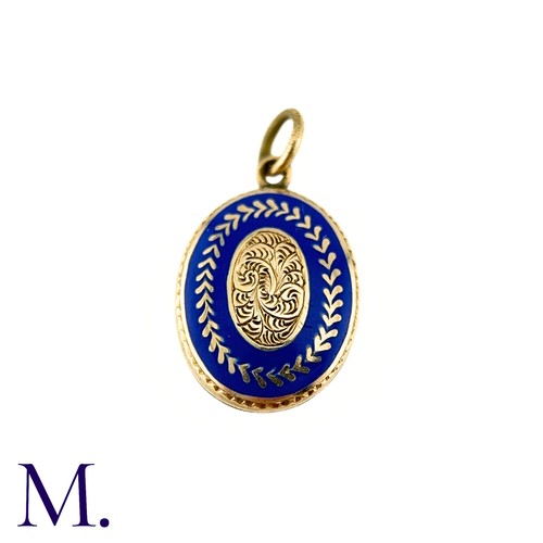 50 - An Antique Mourning Locket Pendant in yellow gold, the oval form with engraved scrolling detail to t... 