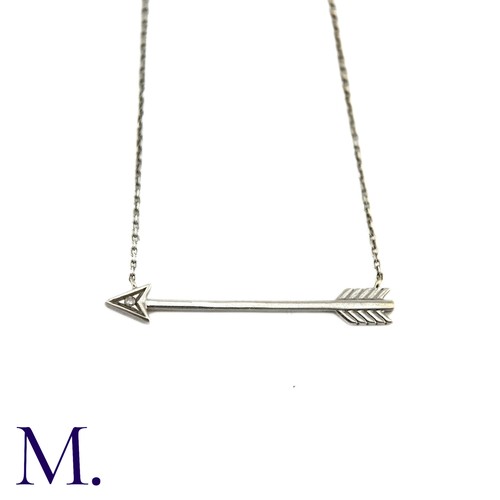 54 - A Diamond Arrow Pendant Necklace in 9k white gold, designed as an arrow set to the head with a round... 