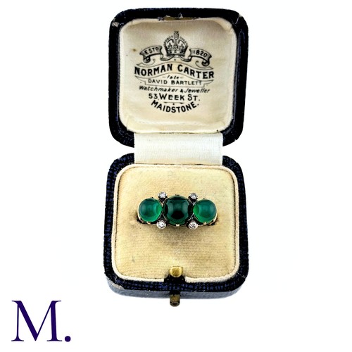 23 - An Antique Chrysoprase and Diamond Ring in 18K yellow gold.  Set with three cabochon chrysoprase sto... 