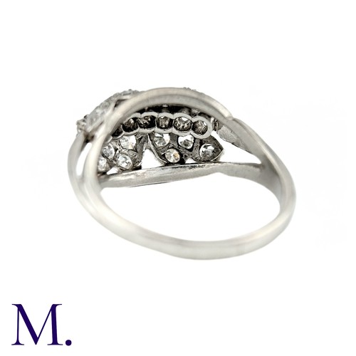 56 - A Diamond Ring in 18K white gold set with 23 diamonds amounting to x ct.

Size:
Weight: 7.5g