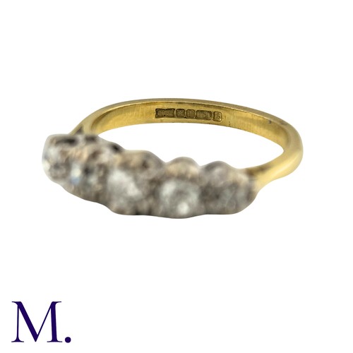 24 - A Diamond Five Stone Ring in 18k yellow gold, comprising five old cut diamonds totalling approximate... 