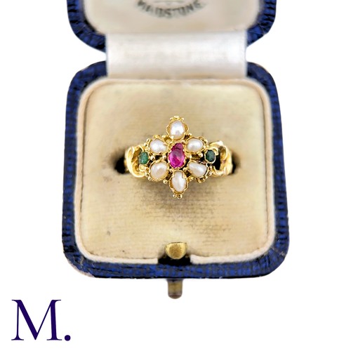 27 - An Antique Ruby, Pearl And Emerald Ring in yellow gold, set with a central pear shape ruby, surround... 