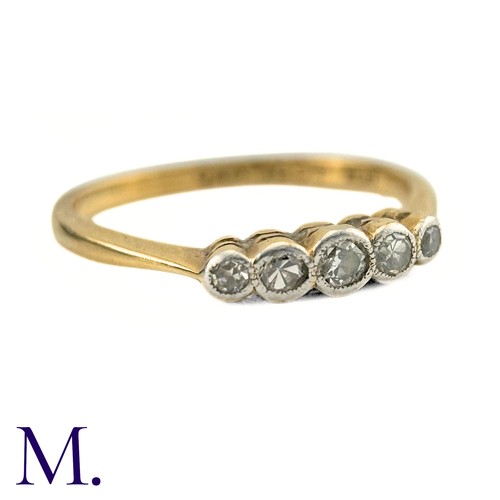 62 - A Diamond Five Stone Ring in 18k gold and platinum, designed as a row of five round cut diamonds col... 