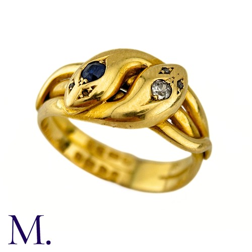 42 - An Antique Sapphire And Diamond Snake Ring in 18k yellow gold, designed and two intertwined snakes o... 