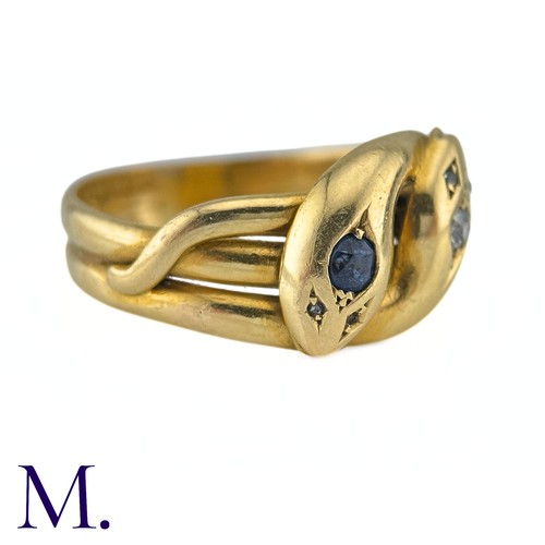 42 - An Antique Sapphire And Diamond Snake Ring in 18k yellow gold, designed and two intertwined snakes o... 