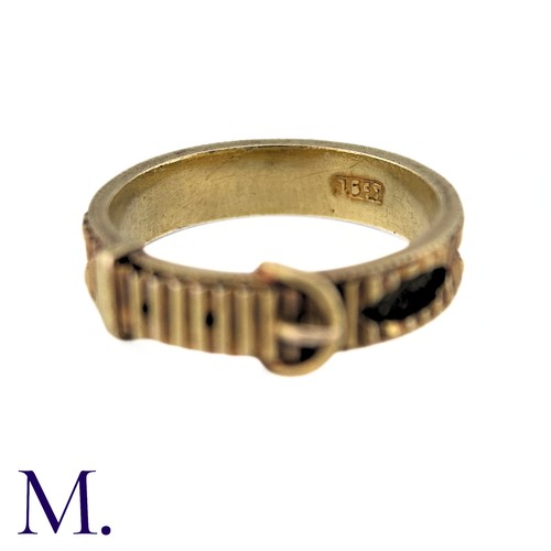 40 - An Antique Hairwork Mourning ring in 15k yellow gold, of belt buckle design the fluted band with nav... 