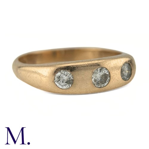 60 - A Diamond Gypsy Ring in 9k yellow gold, set with three round cut diamonds totalling approximately 0.... 