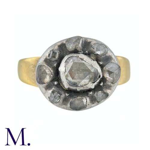 39 - An Antique Rose Cut Cluster Ring in yellow gold and silver, comprising a cluster of rose cut diamond... 