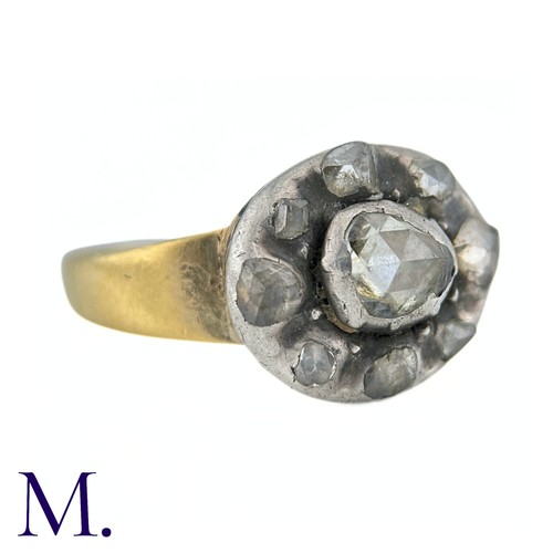 39 - An Antique Rose Cut Cluster Ring in yellow gold and silver, comprising a cluster of rose cut diamond... 