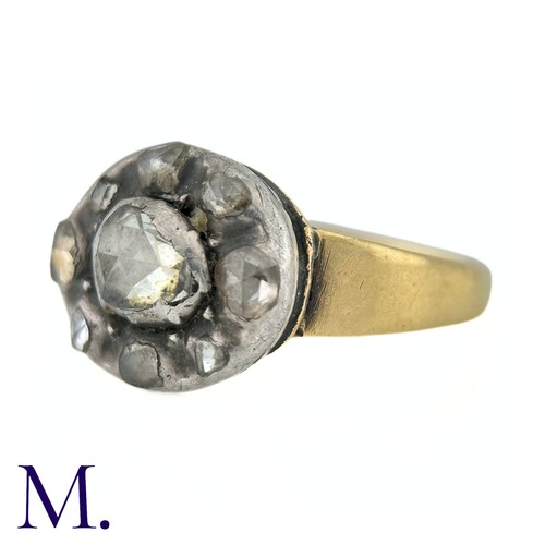 39 - An Antique Rose Cut Cluster Ring in yellow gold and silver, comprising a cluster of rose cut diamond... 