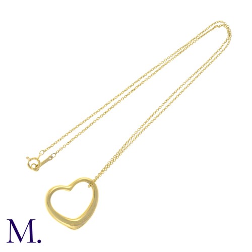 55 - An Open Heart Pendant with Chain by Tiffany & Co. 

The 18ct yellow gold pendant (22mm version) is m... 