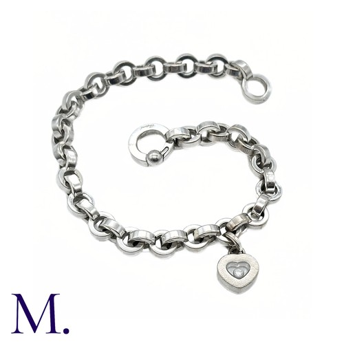 37 - Chopard Diamond Heart Charm Bracelet in 18K white gold.  Marked for Chopard, 18ct white gold with gl... 