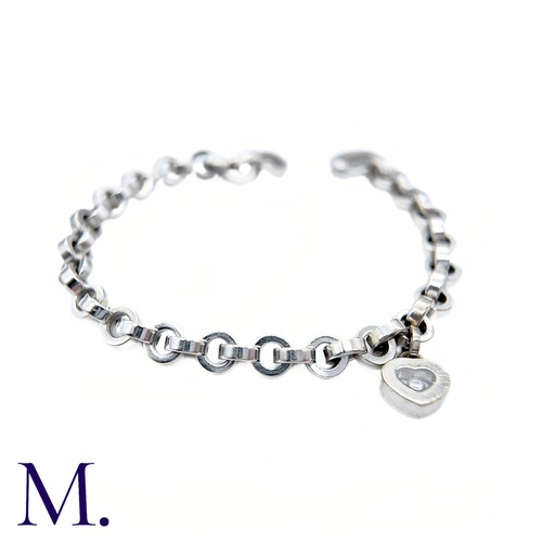 37 - Chopard Diamond Heart Charm Bracelet in 18K white gold.  Marked for Chopard, 18ct white gold with gl... 