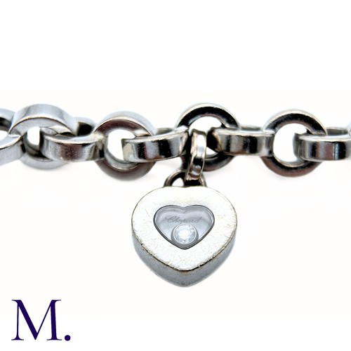 37 - Chopard Diamond Heart Charm Bracelet in 18K white gold.  Marked for Chopard, 18ct white gold with gl... 