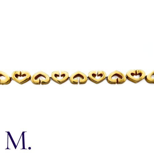 81 - Cartier. A Heart Bracelet in 18K yellow gold with alternating hearts.  Marked for 18ct gold, Cartier... 