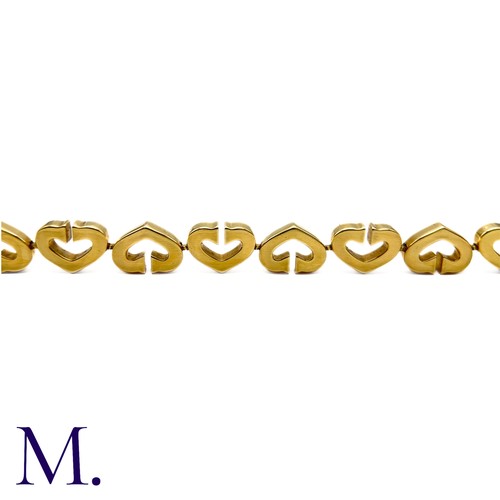 81 - Cartier. A Heart Bracelet in 18K yellow gold with alternating hearts.  Marked for 18ct gold, Cartier... 