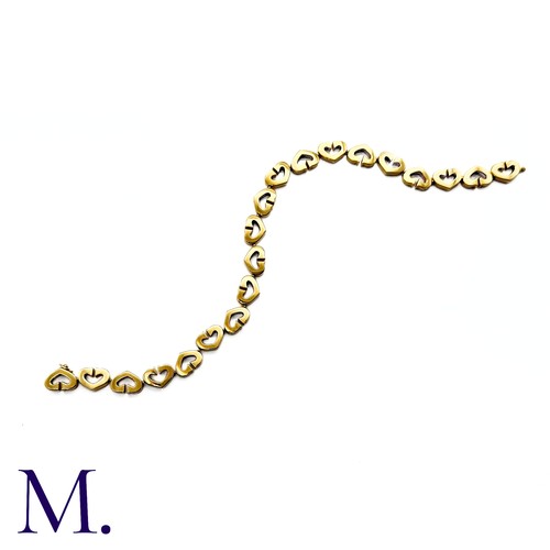 81 - Cartier. A Heart Bracelet in 18K yellow gold with alternating hearts.  Marked for 18ct gold, Cartier... 