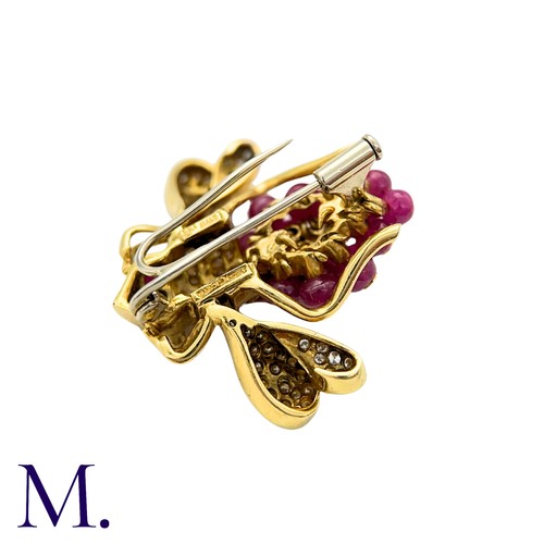 402 - GIOVANE, A Ruby and Diamond Bee Brooch in 18k yellow gold, set with approximately 7.30cts of ruby be... 