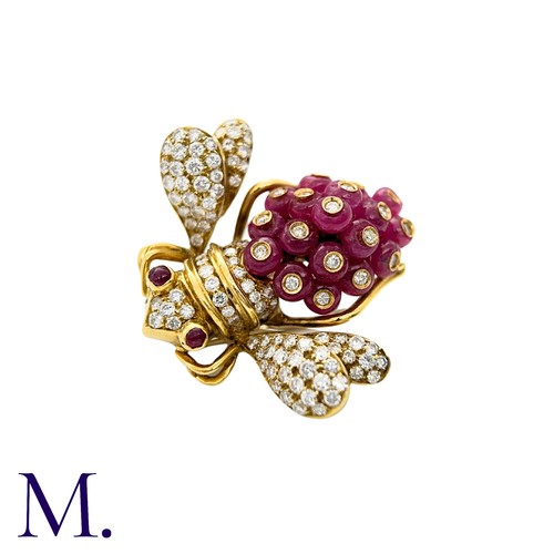 402 - GIOVANE, A Ruby and Diamond Bee Brooch in 18k yellow gold, set with approximately 7.30cts of ruby be... 
