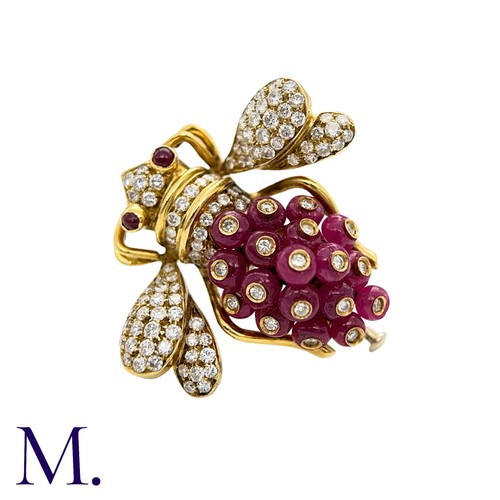 402 - GIOVANE, A Ruby and Diamond Bee Brooch in 18k yellow gold, set with approximately 7.30cts of ruby be... 