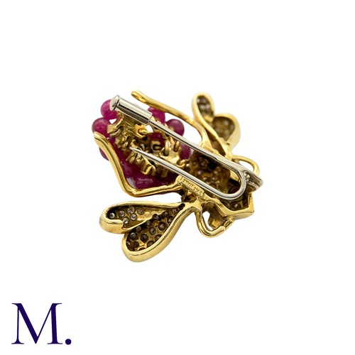 402 - GIOVANE, A Ruby and Diamond Bee Brooch in 18k yellow gold, set with approximately 7.30cts of ruby be... 