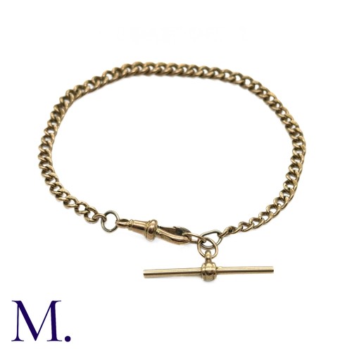 20 - An Antique Curb Bracelet in 9K rose gold with swivel clip and T-bar.  Links marked '375' indicating ... 