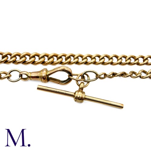 20 - An Antique Curb Bracelet in 9K rose gold with swivel clip and T-bar.  Links marked '375' indicating ... 