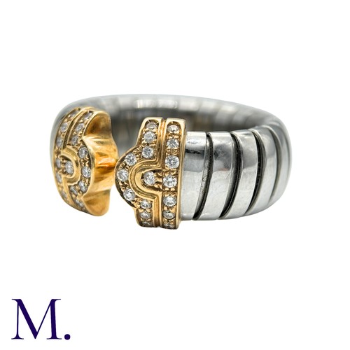 60 - BULGARI , A DIAMOND PARENTESI RING in 18k yellow gold and steel, the terminals set with round brilli... 