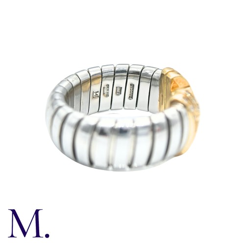 60 - BULGARI , A DIAMOND PARENTESI RING in 18k yellow gold and steel, the terminals set with round brilli... 