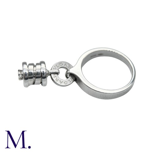 239 - BVLGARI, A Diamond B.zero1 Ring in 18k white gold, set with a dangling B.Zero1 Element, set with a r... 