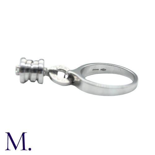 239 - BVLGARI, A Diamond B.zero1 Ring in 18k white gold, set with a dangling B.Zero1 Element, set with a r... 