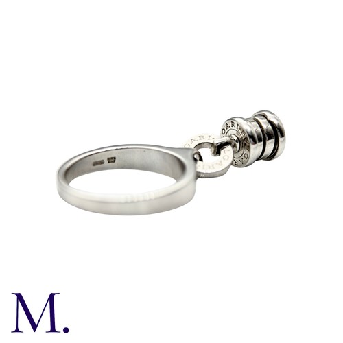 239 - BVLGARI, A Diamond B.zero1 Ring in 18k white gold, set with a dangling B.Zero1 Element, set with a r... 